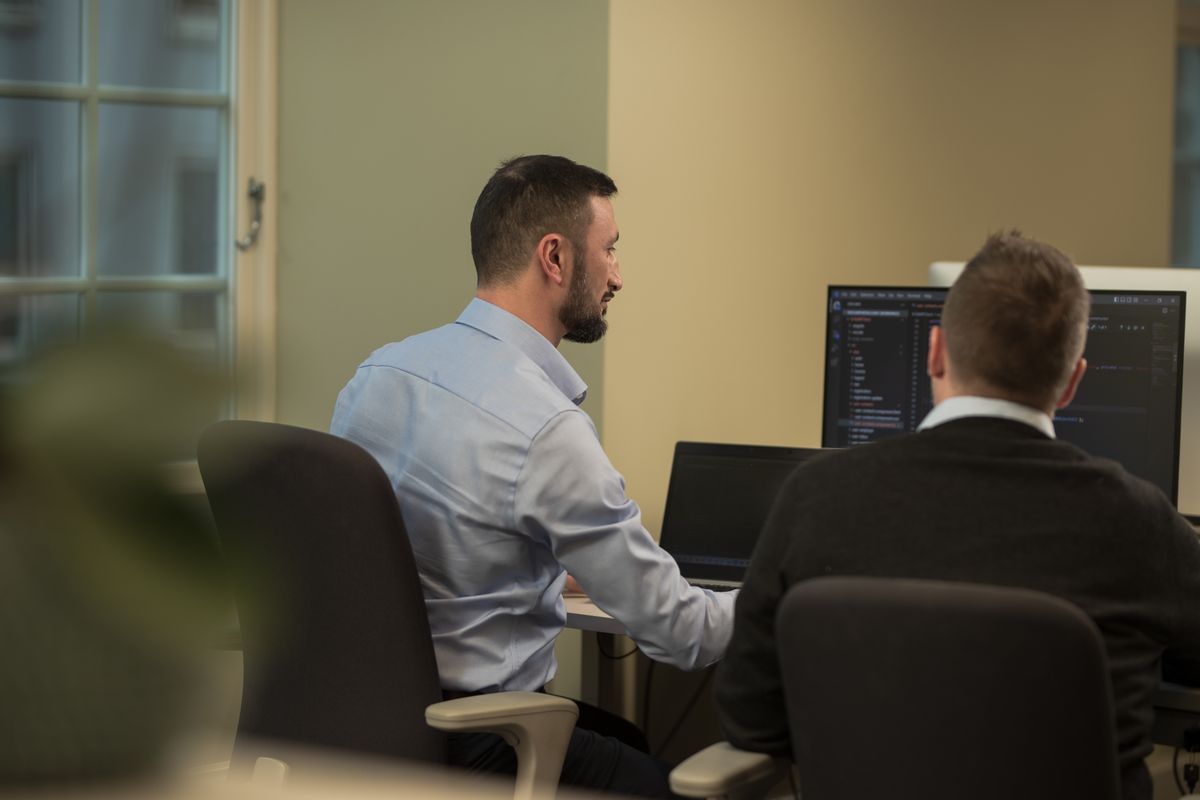 Developers working at their stations